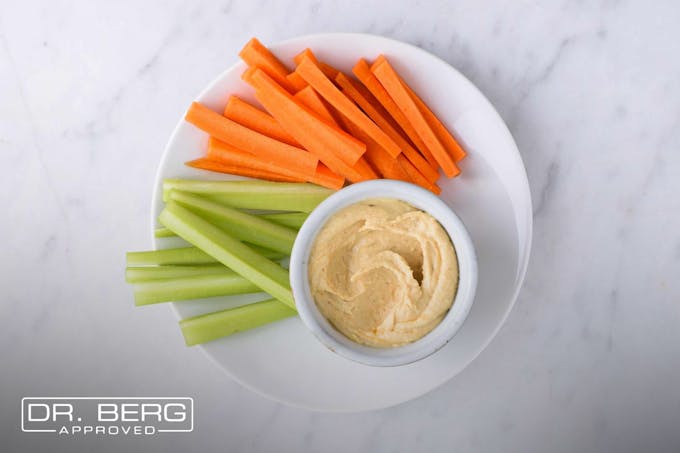 Celery, carrots, and cucumbers with ranch dressing dip