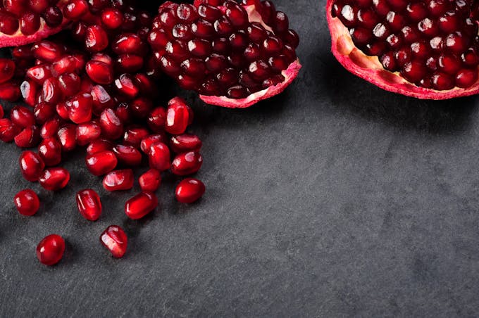 Table with pomegranate seeds