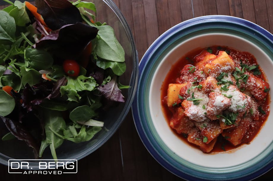 Gnocchi next to salad