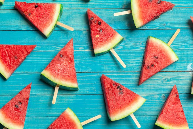 Sliced watermelon on sticks