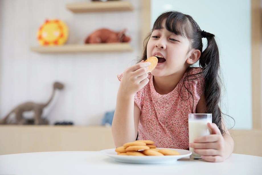 Child eating cookies