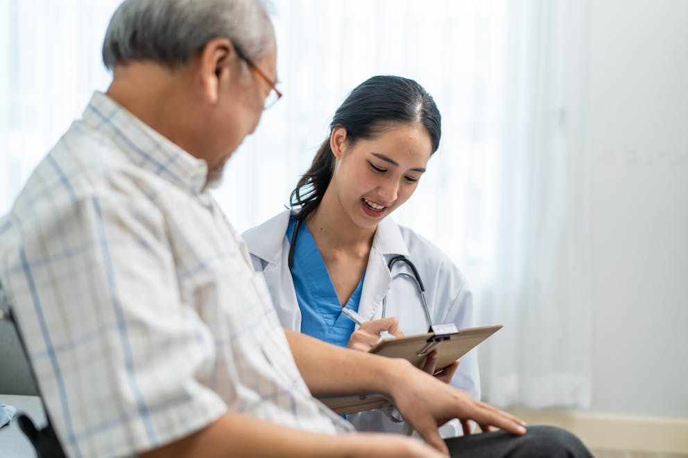 doctor speaking with a patient