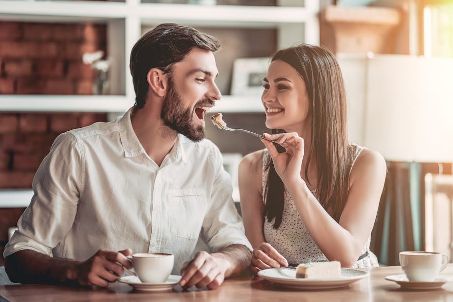 Couple eating and drinking