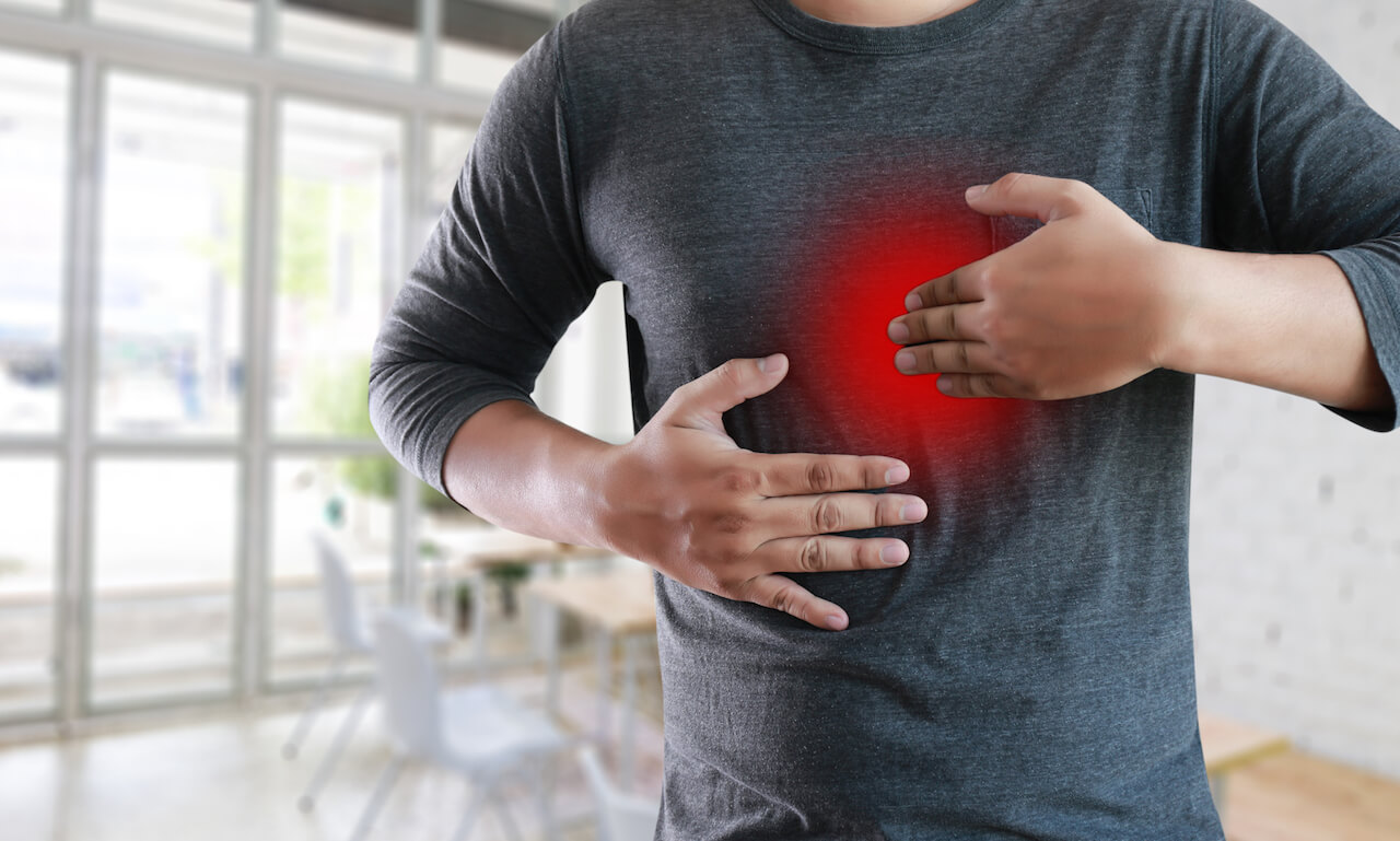 A person with heartburn | 10 Tums Side Effects
