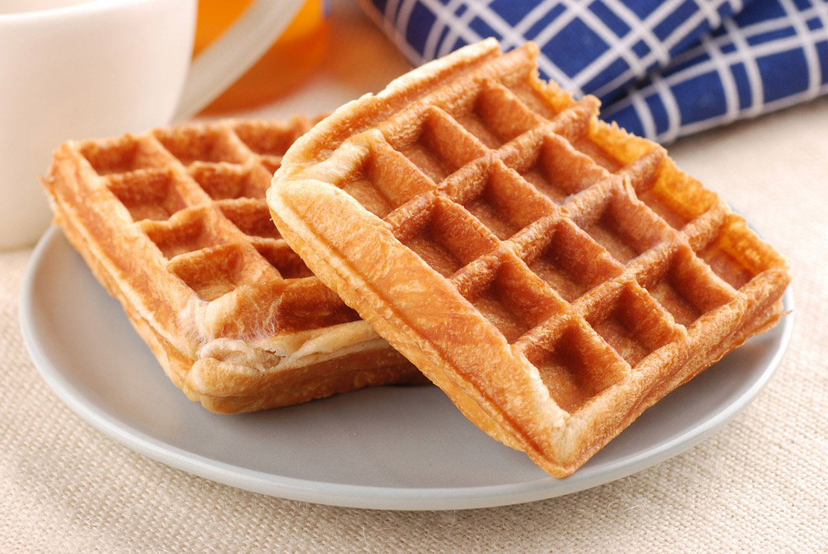 Grain-free waffles stacked on a plate