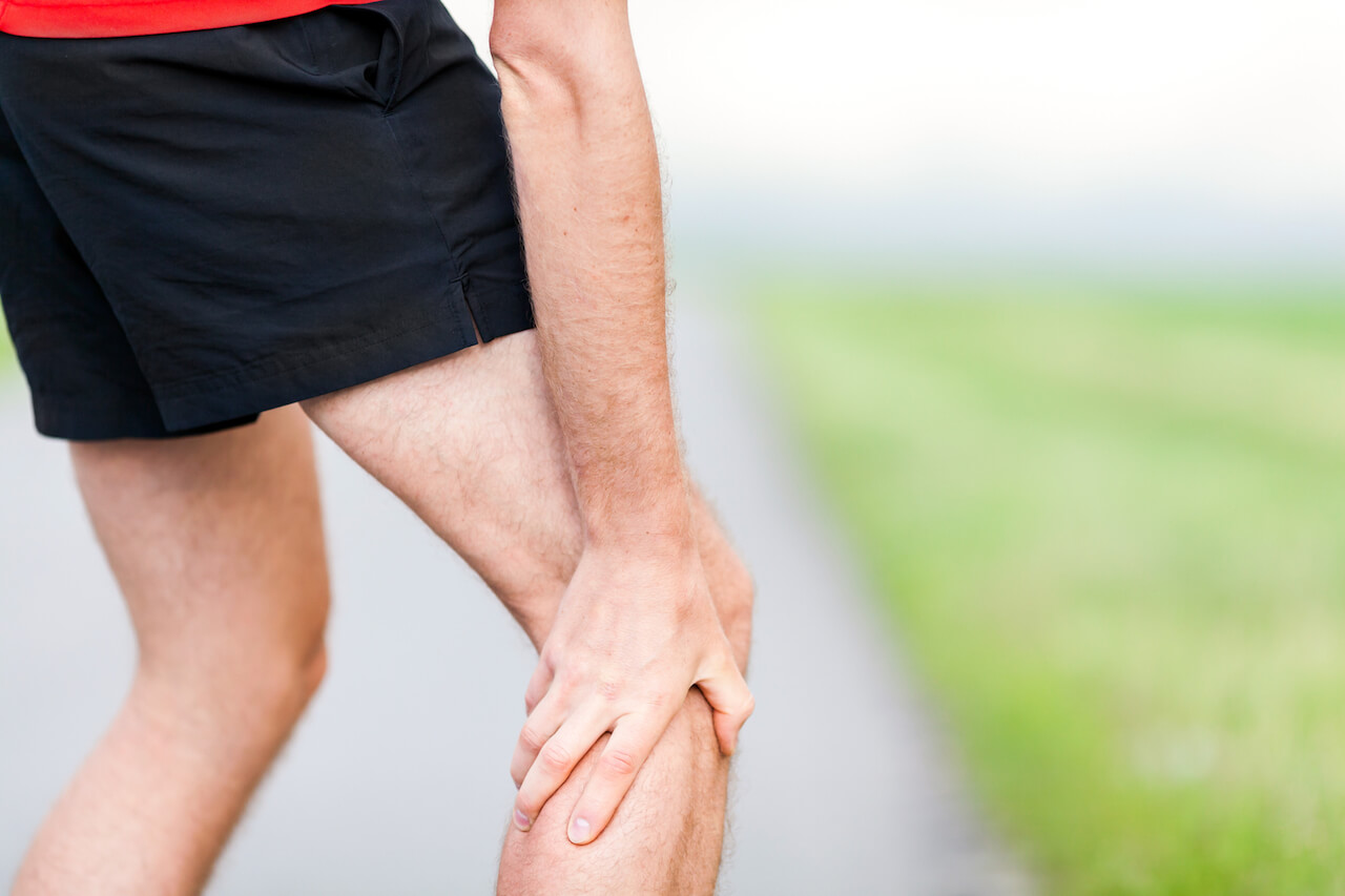 Runner with old injury during running outdoors. | 5 Tips in Dealing with Old Injuries as you are Aging