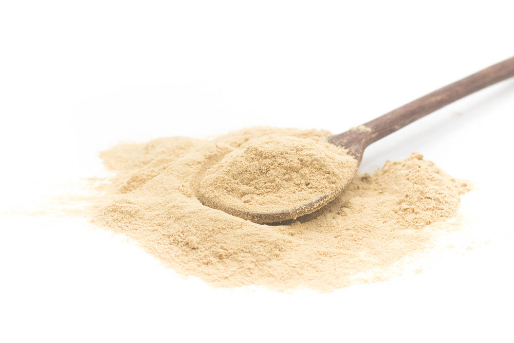 Nutritional yeast flakes can be added to any dish you'd add cheese to.