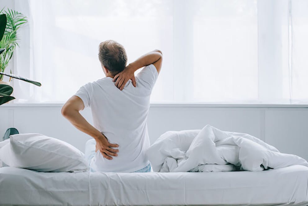 Man stretching in bed with neck and back pain | Amazing Stretching Techniques