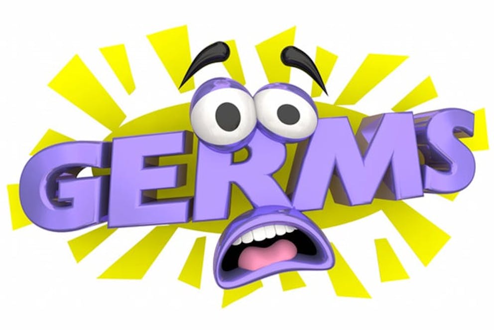 Cartoon face looking scary drawn with the word “Germs” in purple with yellow highlight.