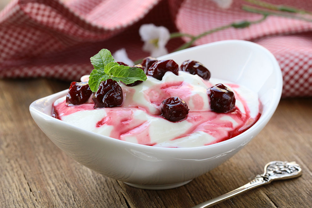yogurt with cherries and sweet sauce