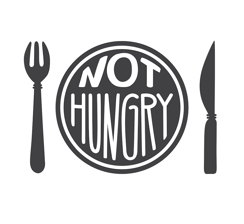 a black and white vector photo of a plate with the words Not Hungry on it
