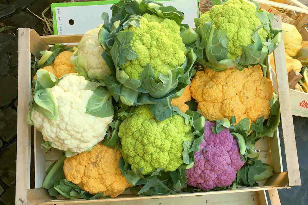 Colorful cauliflowers in the wooden box on market place | Keto Cauliflower: Reasons Why Cauliflower Is The Ultimate Keto Food | benefits of eating cauliflower