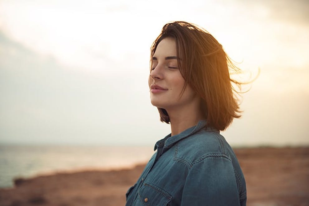 a photo of a calm woman 