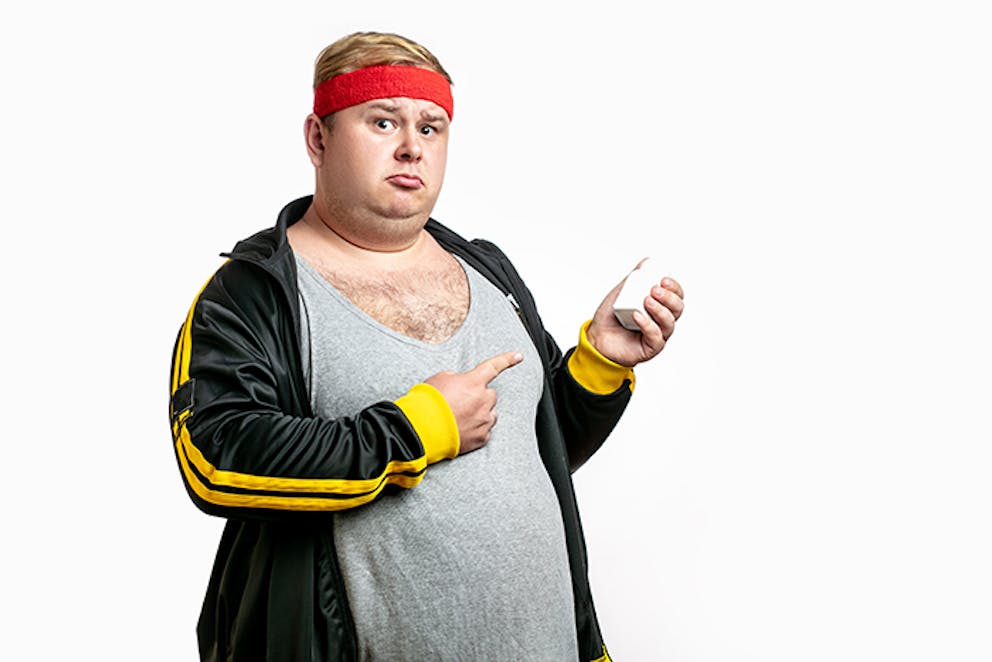 overweight man with enlarged breasts