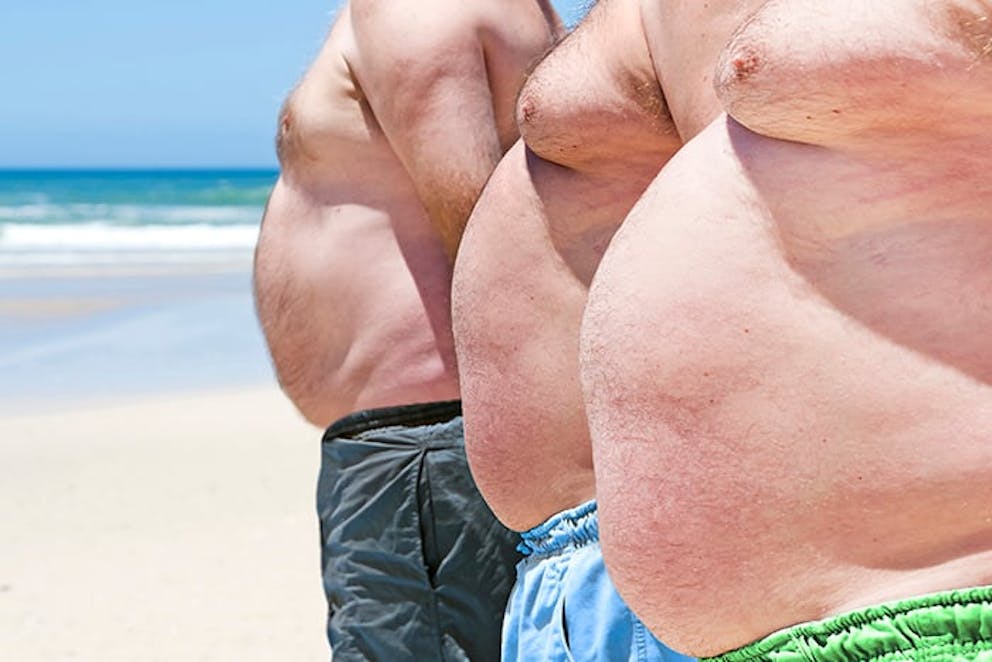 three obese men’s bellies