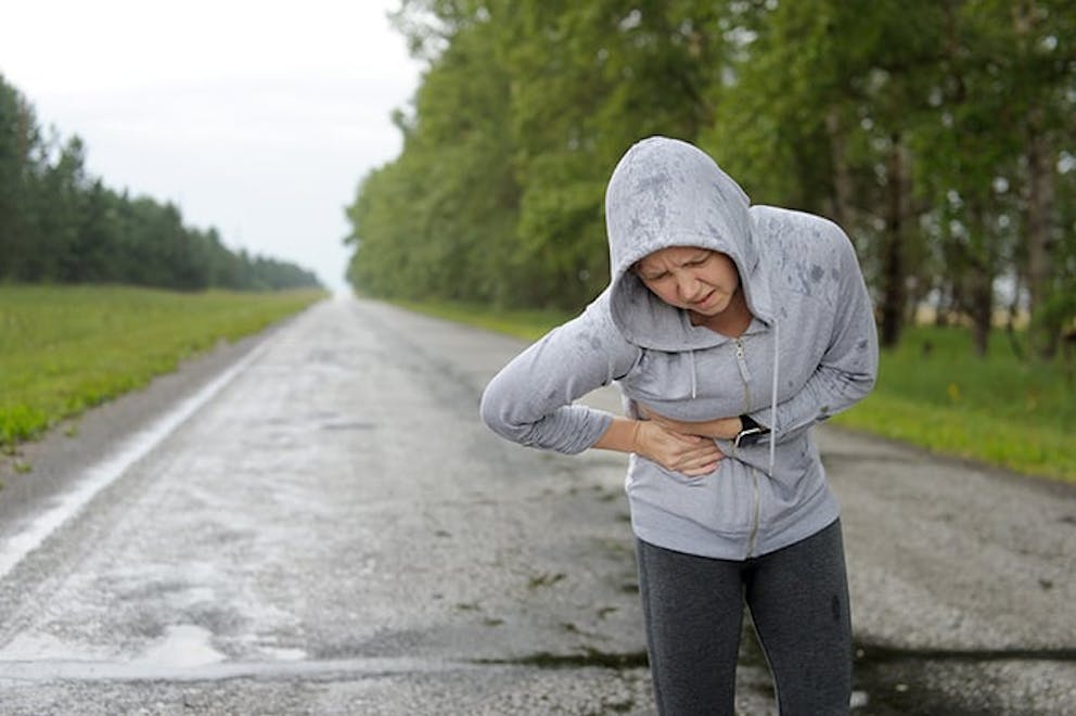 a woman out of breath from jogging