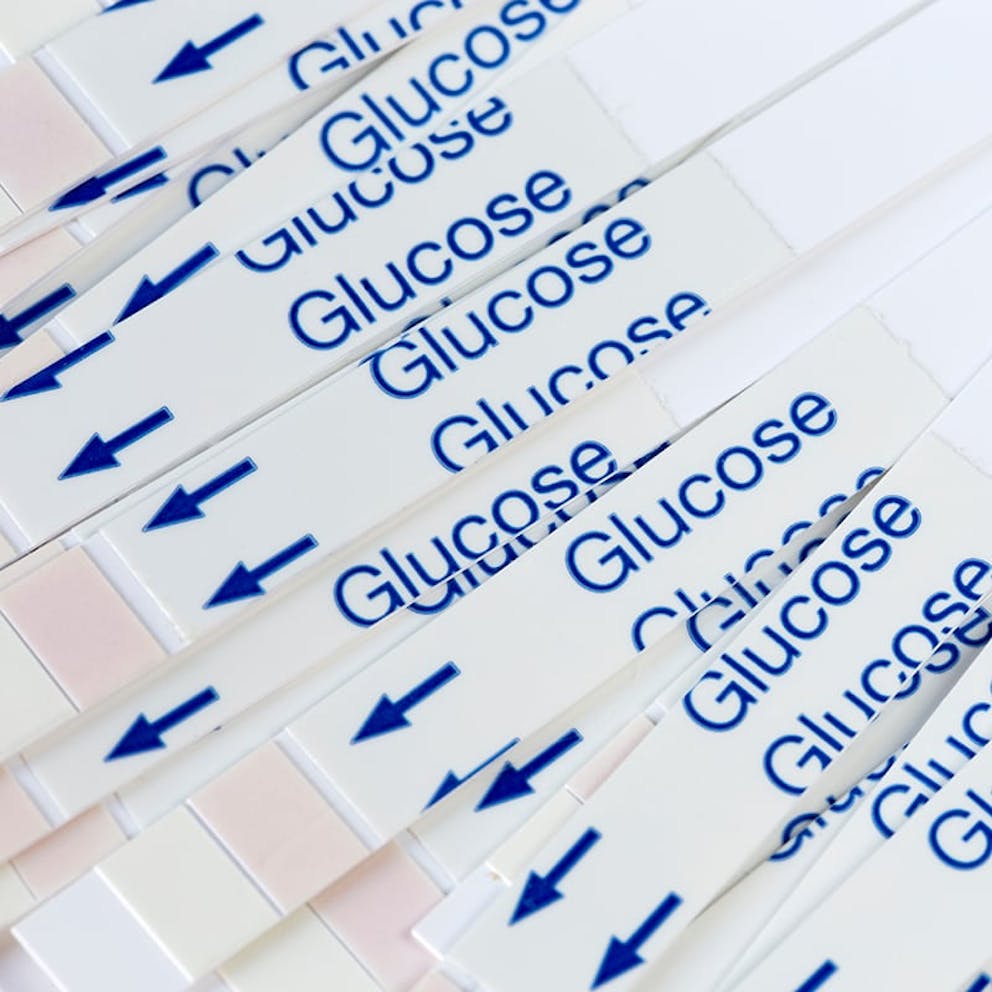 a picture of white strips with the word glucose printed on them