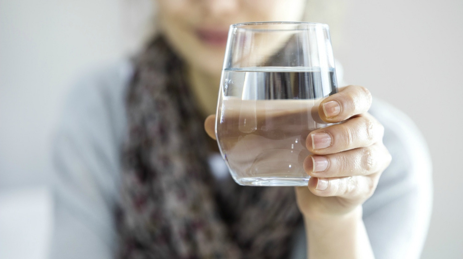 Featured | Young woman drinking water | Intermittent Fasting On The Ketogenic Diet