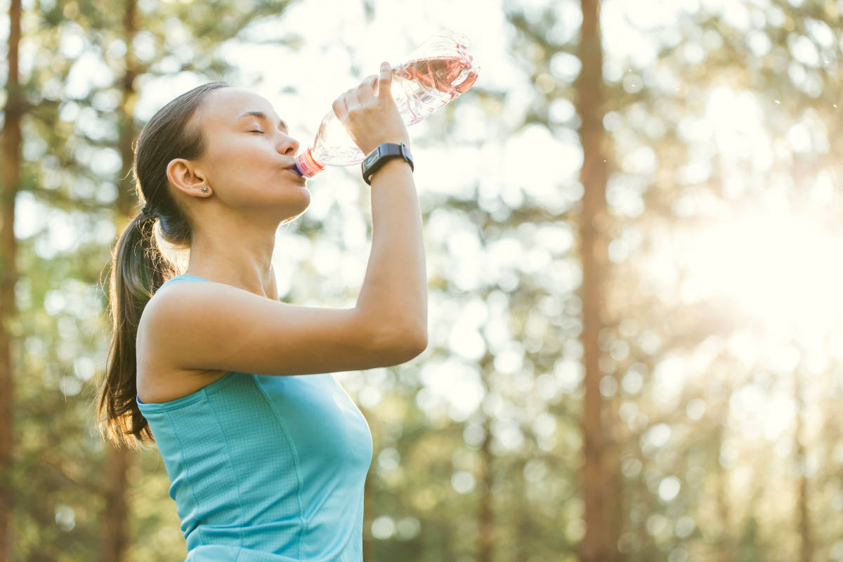 Beautiful fitness athlete woman drinking water after work out | Ketogenic Diet Tips and Tricks