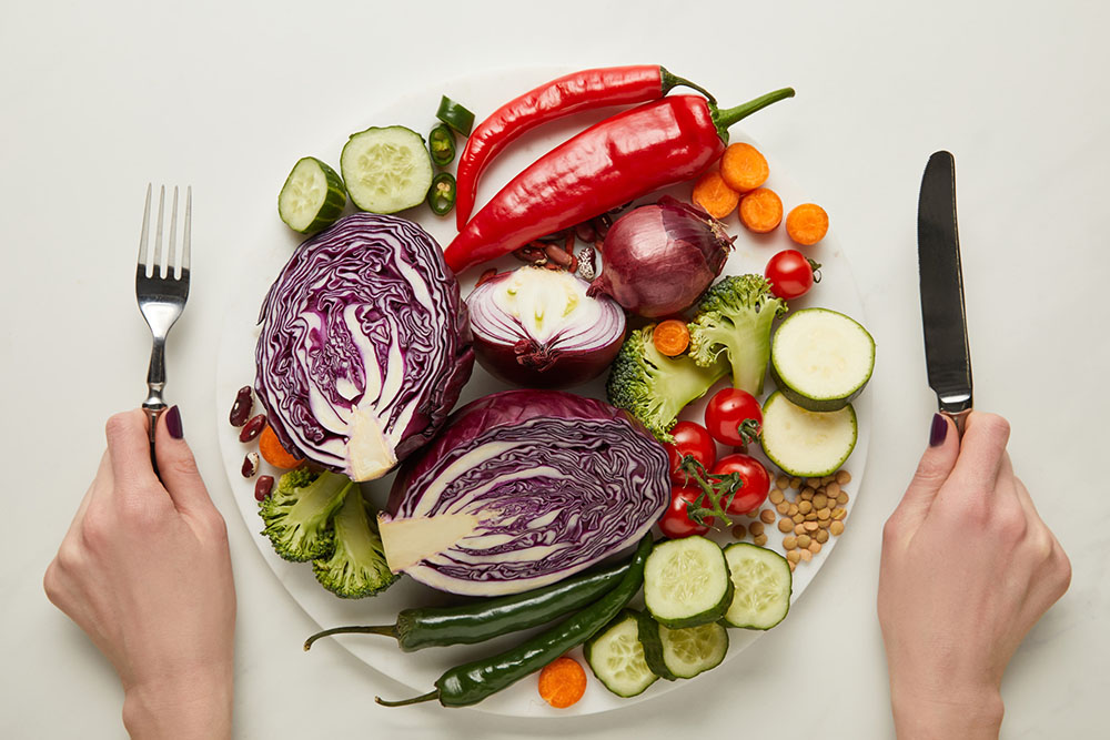 a plate full of fresh vegetables