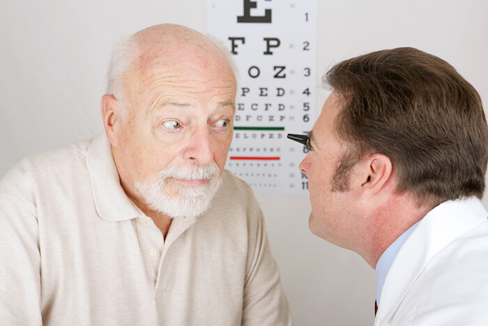 An older man getting an eye exam. |  Natural Remedies for Cataracts