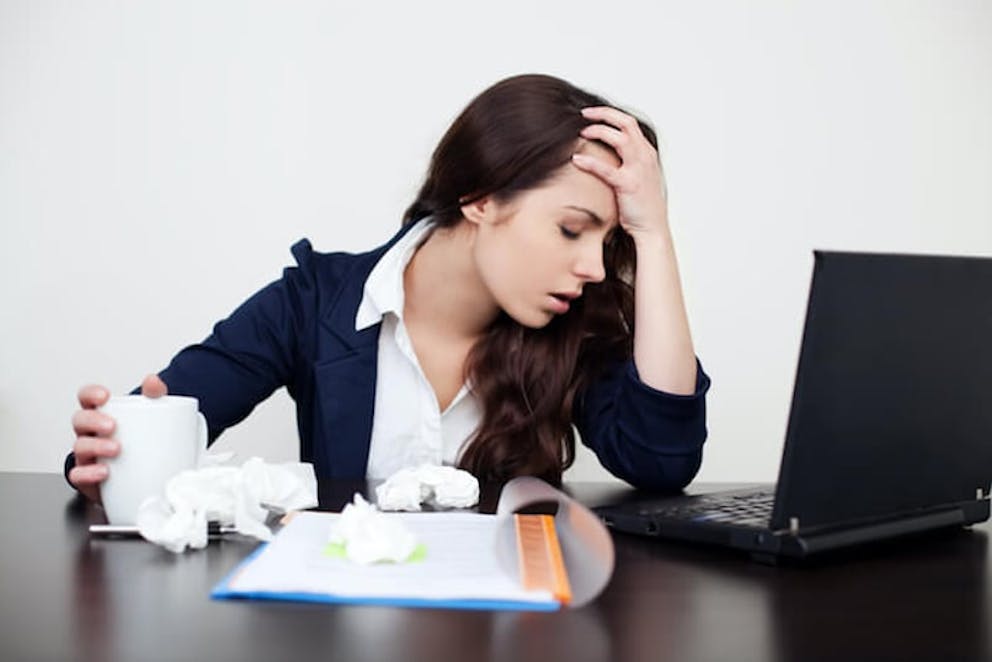 Business woman stressed and sick at work | Stress and Your Immune System