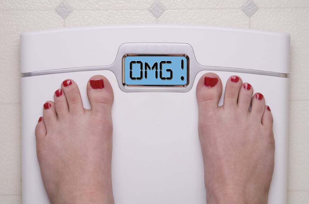 picture of a scale with OMG! where the weight display is
