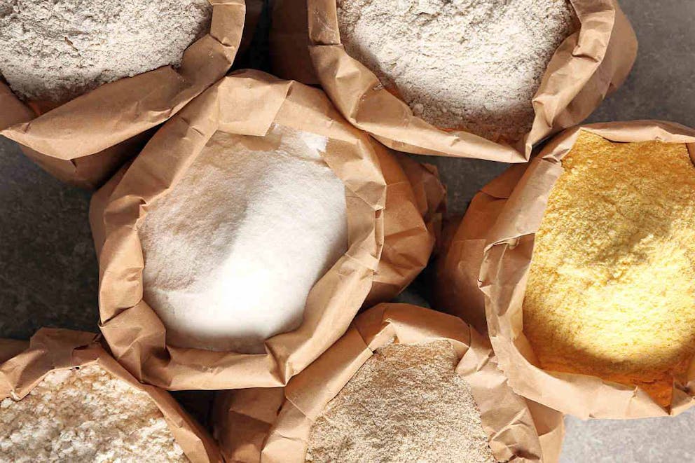 Paper bags with different types of flour  | List Of Starches That Are Worse Than Sugar | carbs vs sugar