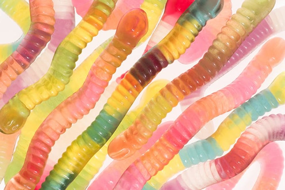 a photo of a variety of colored gummy worms