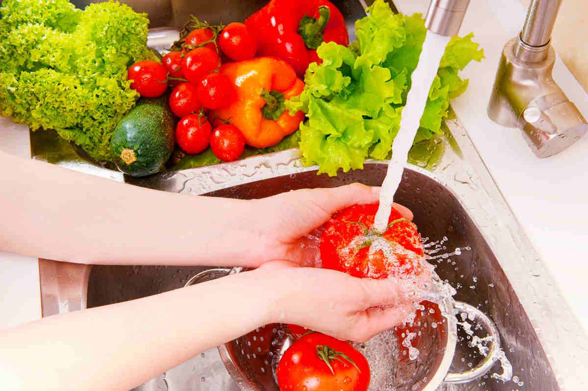 Vegetables washing, splashing water, fresh salad preparation | What Really Causes Puffy Eyes and Bags?