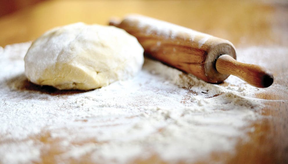 Dough roll, baking | White Sugar Vs White Flour: Which Is More Unhealthy? | refined sugar