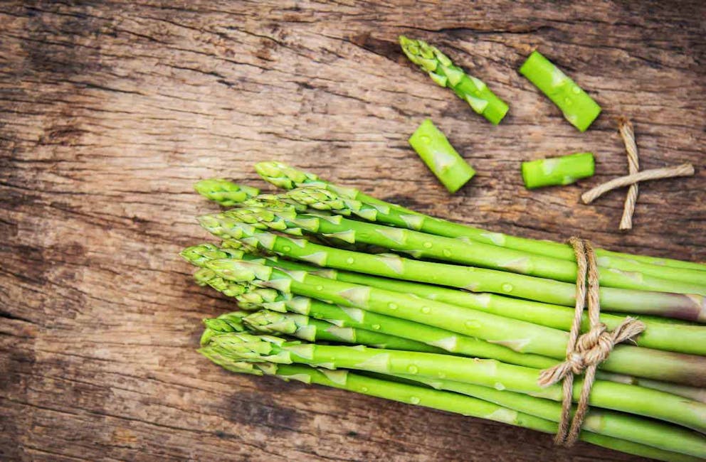 Asparagus on wooden background | Alkaline Water Side Effects: Here's Why You Should NOT Drink It! | natural alkaline water