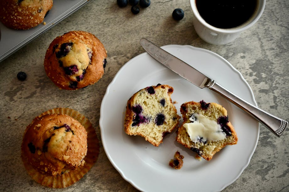 Blueberry muffins with butter