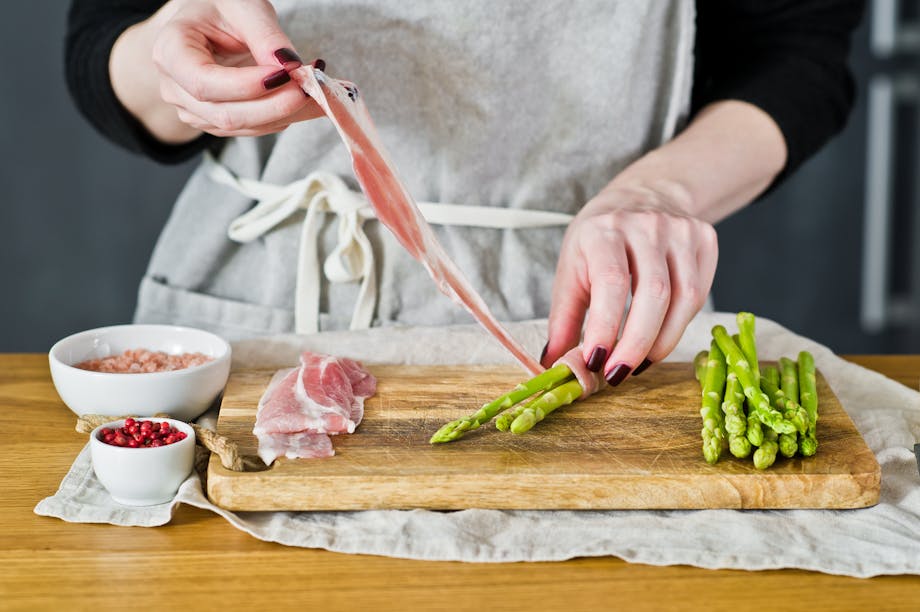 Making bacon-wrapped asparagus