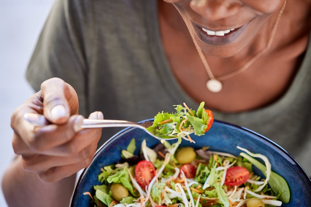 Woman eating a salad