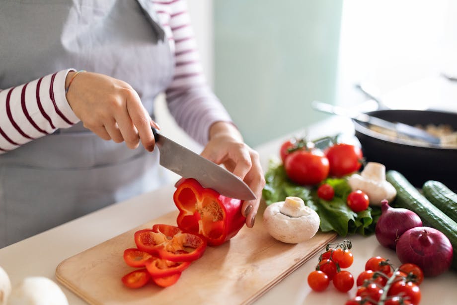 Woman cutting vegetables