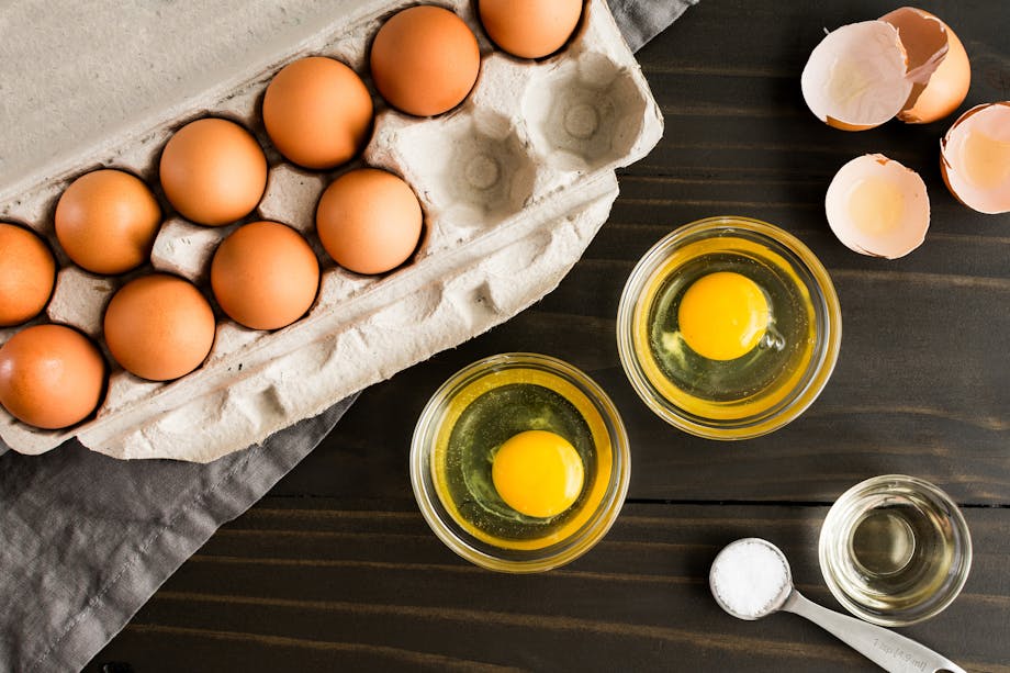 Eggs in carton and bowl