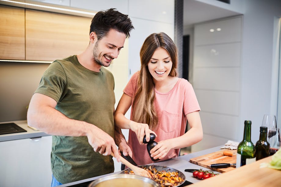 Couple making stir-fry