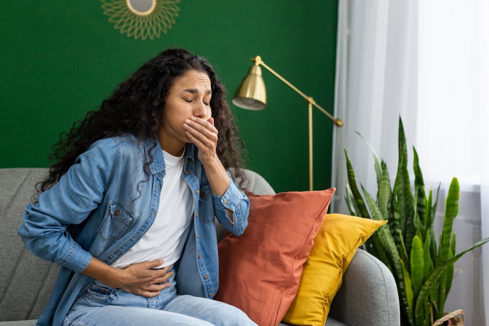 Woman feeling nauseous