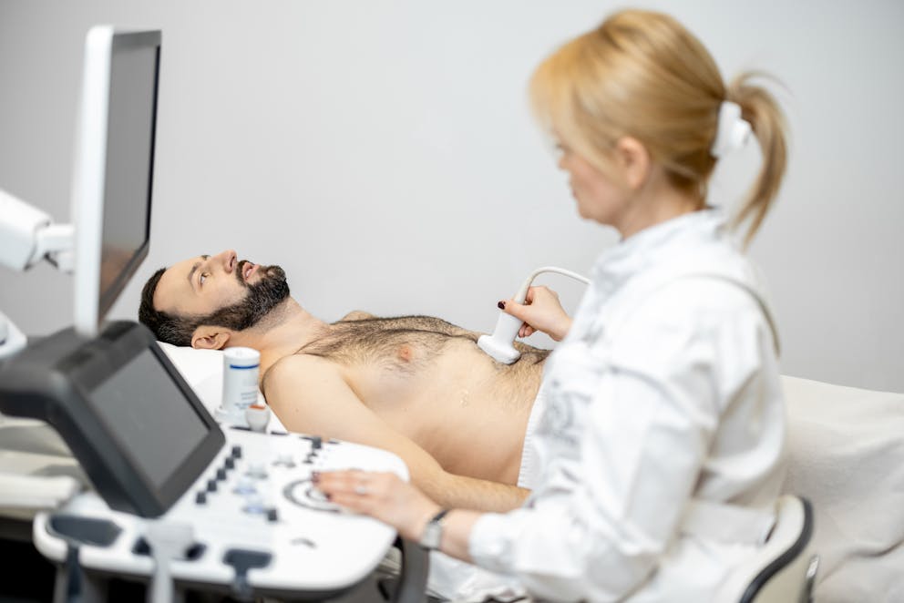 Doctor performing a liver scan