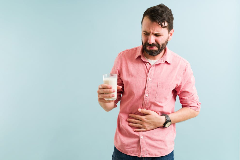 Man holding a glass of milk