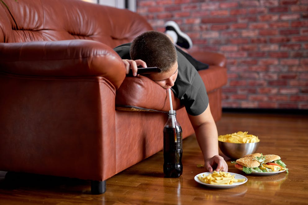 Boy eating processed foods