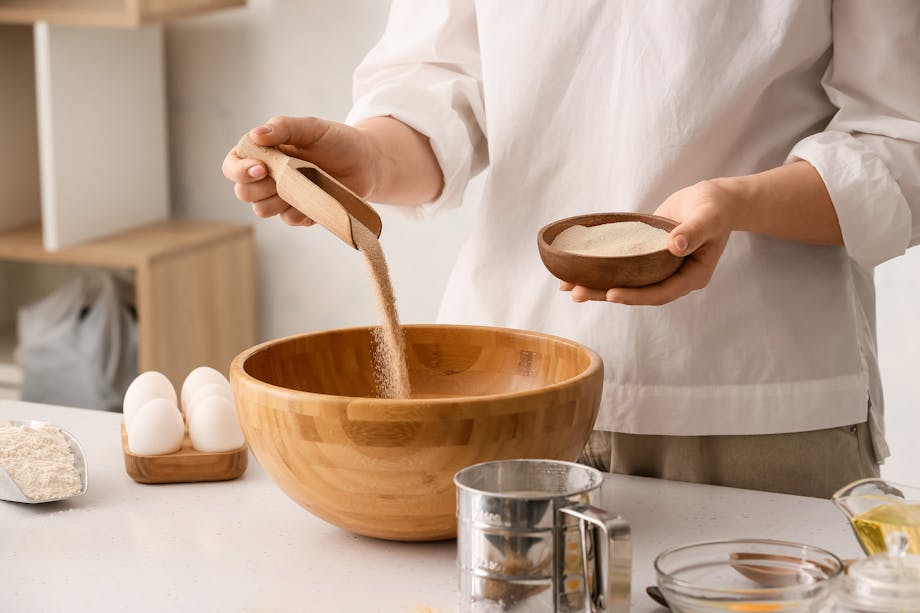 Adding dry yeast to a bowl