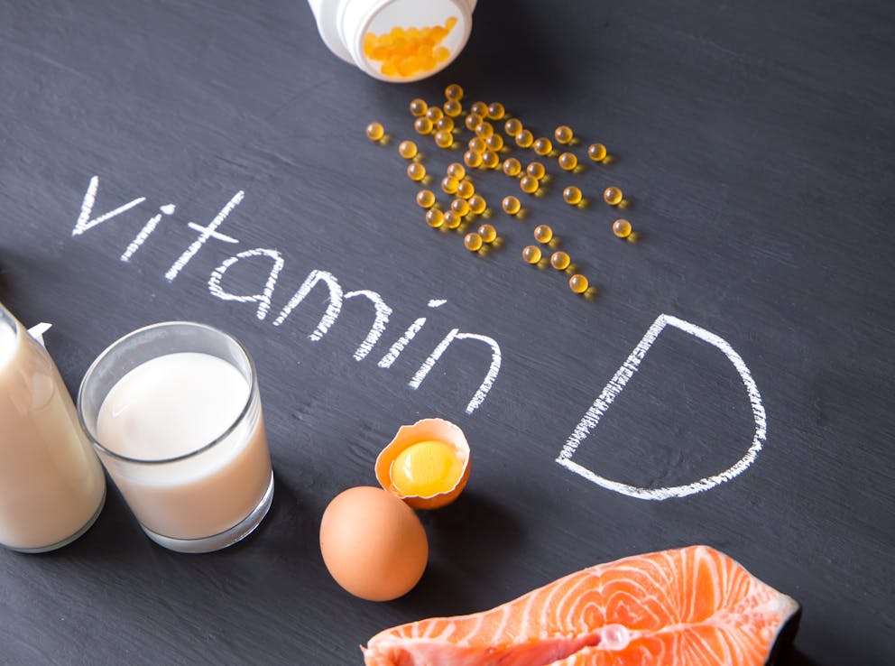 Foods containing and rich in vitamin D and yellow pills