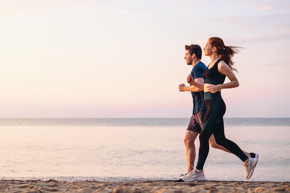 Healthy couple exercising outside