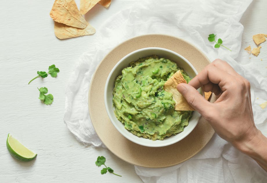 Dipping chip in guacamole