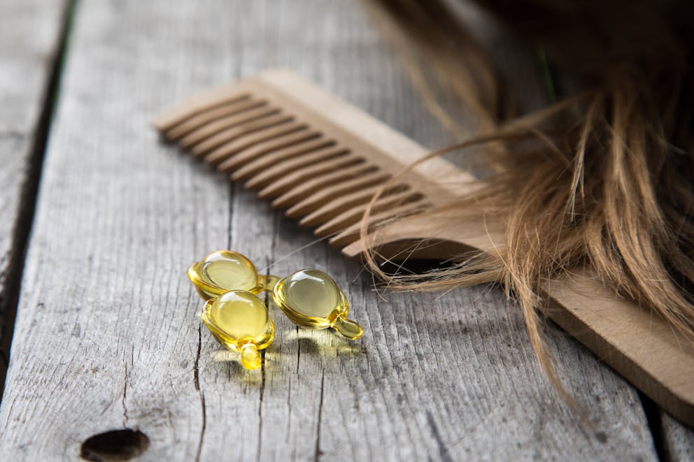 Vitamin D supplement and hair comb