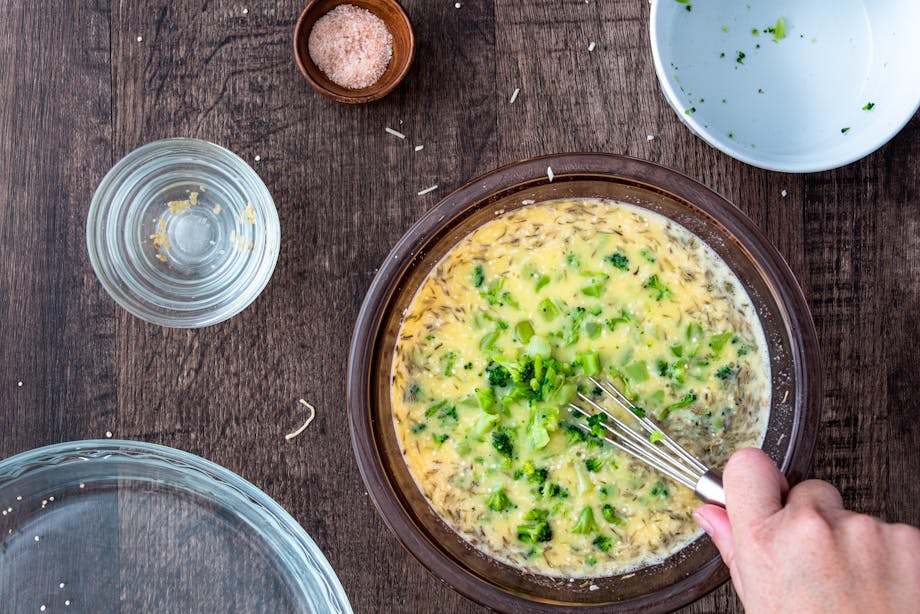 Whisking eggs and broccoli