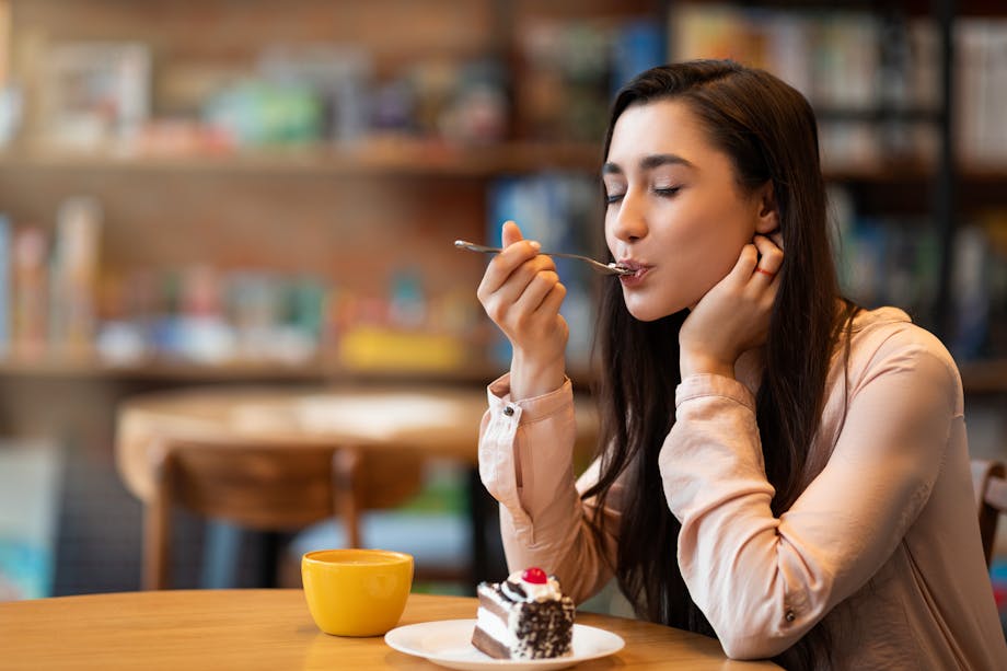 Woman enjoying chocolate cake