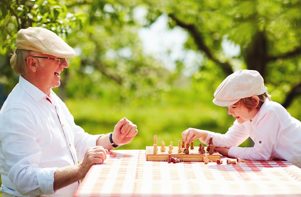 Older man playing chess